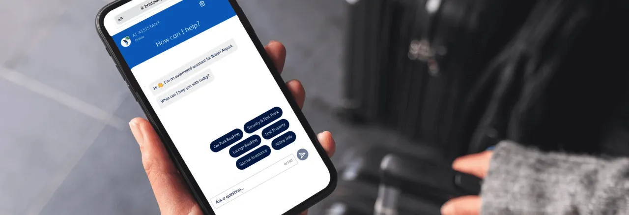 Bristol Airport AI chatbot open on a smartphone held by a traveller