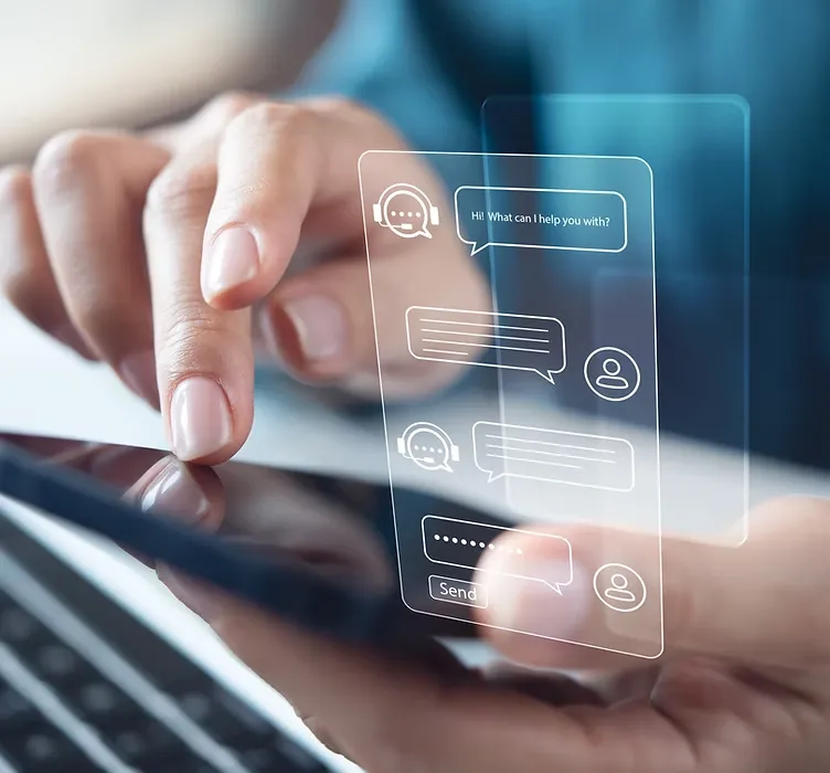 Hand tapping a virtual AI chatbot conversation above a smartphone