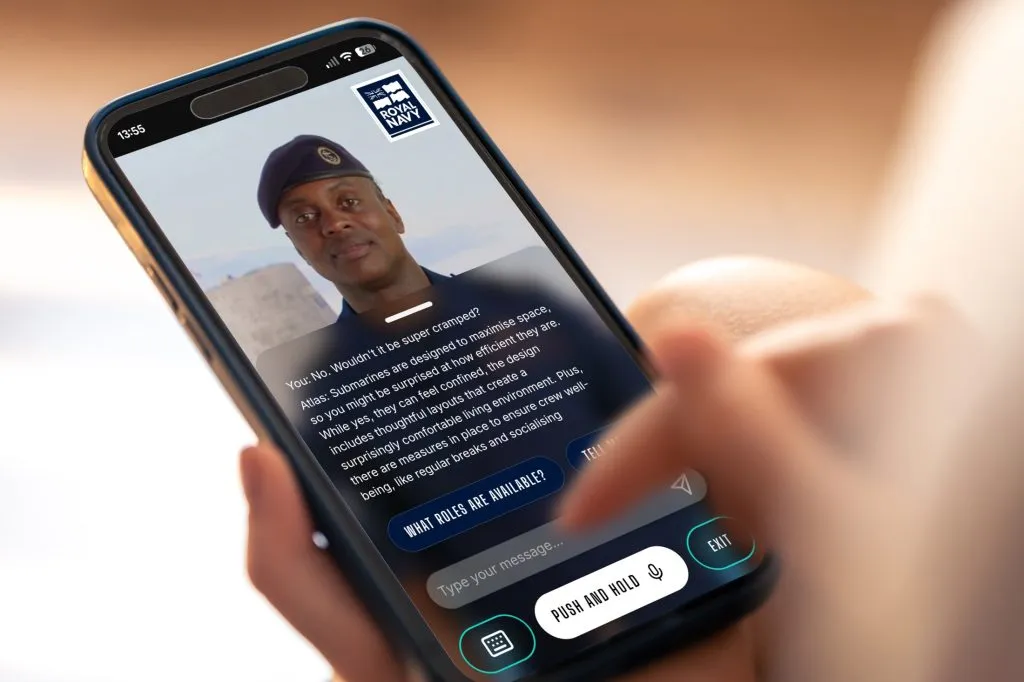 Royal Navy Atlas digital avatar answering recruitment questions on a smartphone